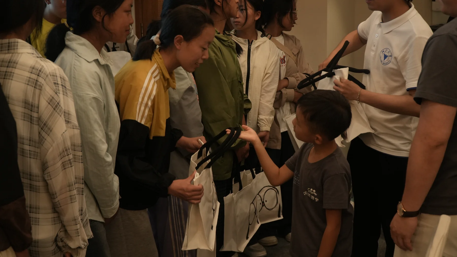 A student looking through a learning kit