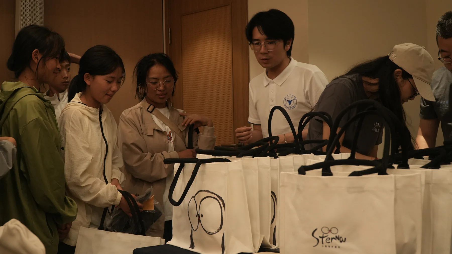 Students receiving learning kits