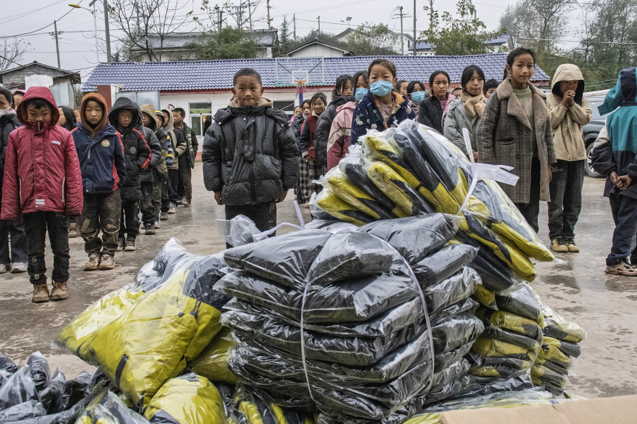 Students and winter supplies during a Sterna charity project