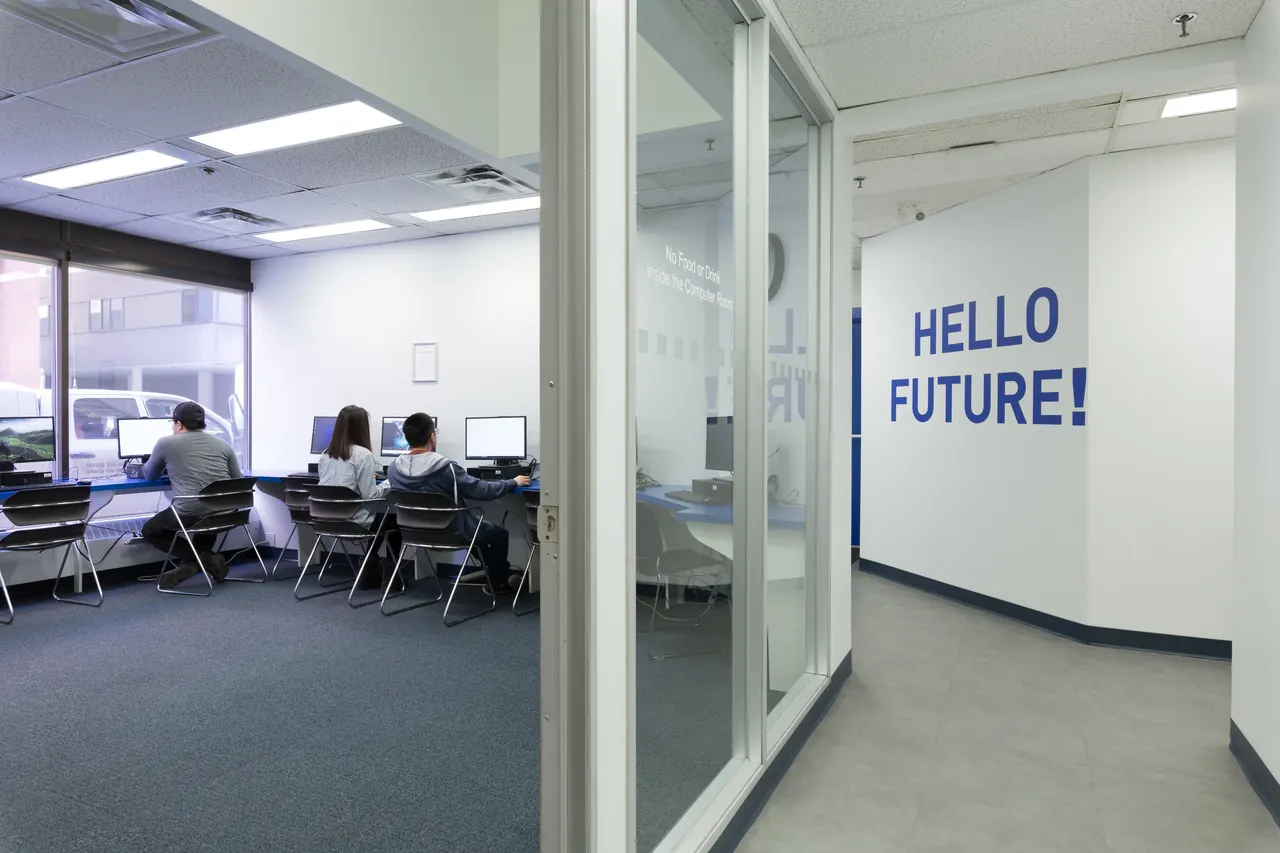 A corridor with classrooms at the Bayswater Calgary campus