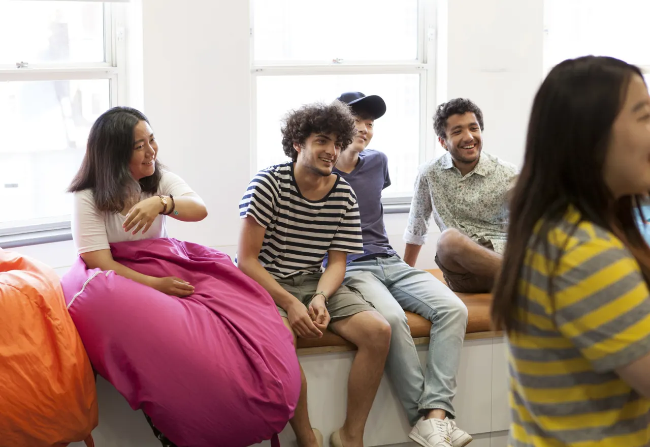 Students taking part in a classroom discussion at EC Brighton