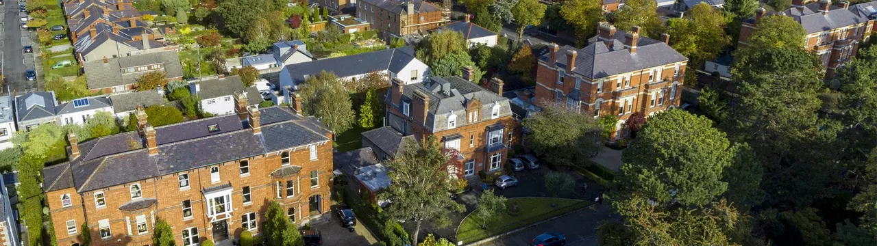 Emerald Palmerston Park campus: aerial view of red-brick buildings, trees and grounds.