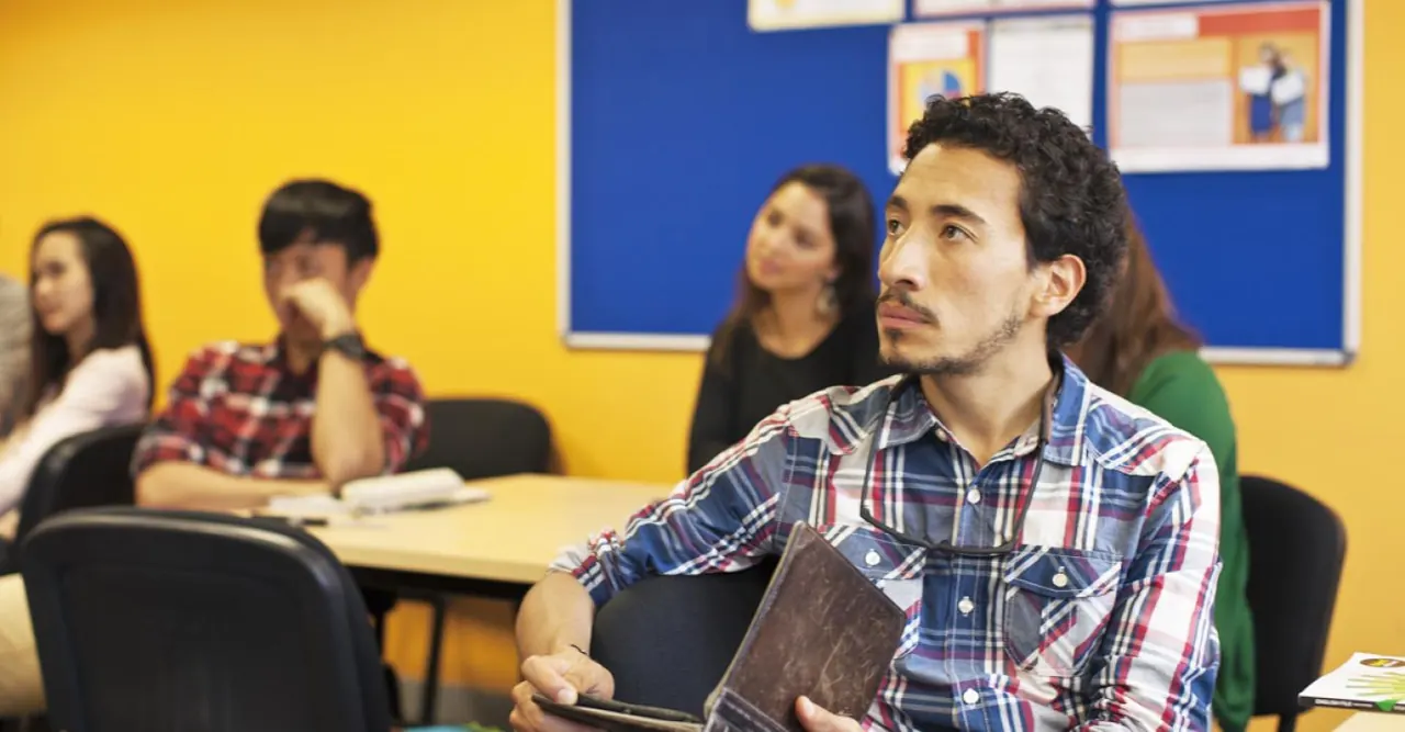 Impact English College Melbourne — Students seated at desks in a Melbourne campus classroom.