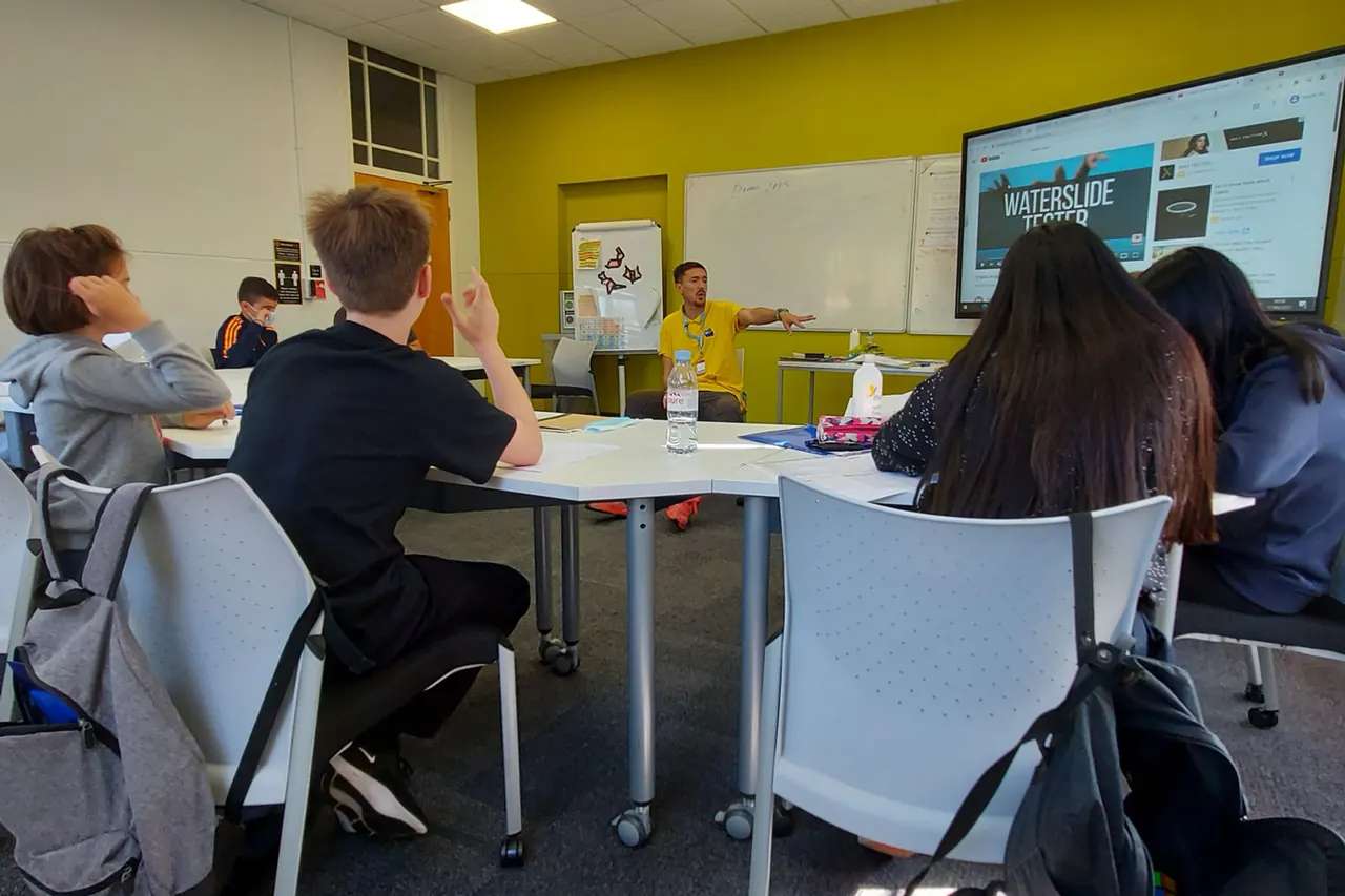 SKOLA English in London — Students working in groups in a bright classroom